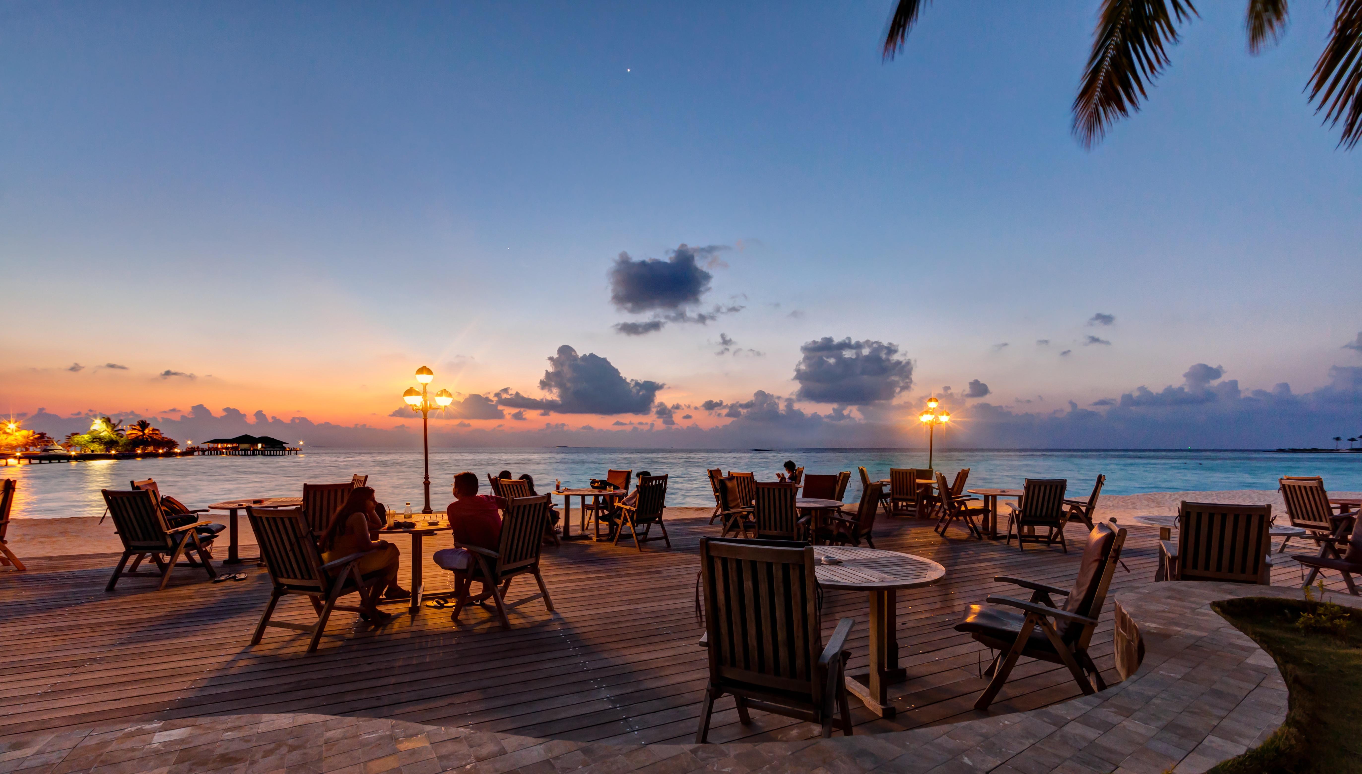 Villa Nautica Paradise Island Resort Himmafushi Esterno foto Sunset at the beach