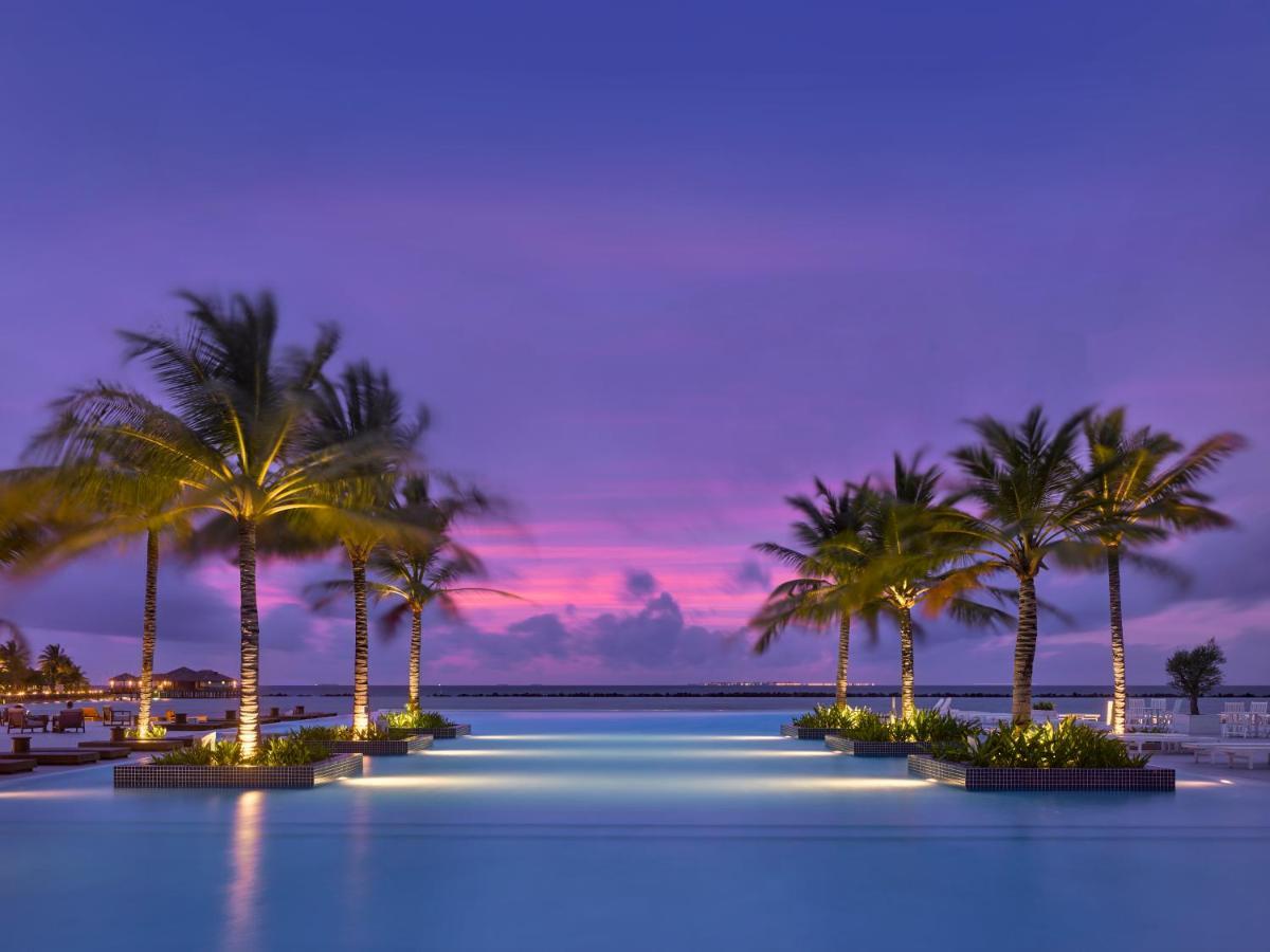 Villa Nautica Paradise Island Resort Himmafushi Esterno foto Sunset at the pool